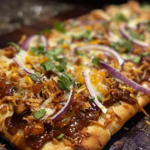 Delicious easy BBQ chicken flatbread topped with fresh ingredients.
