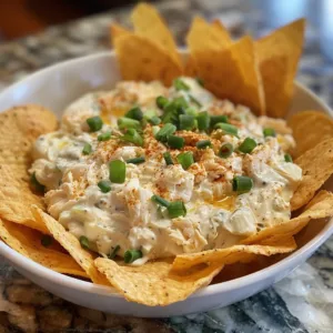 Delicious Crab Rangoon Dip served with crispy wonton chips.