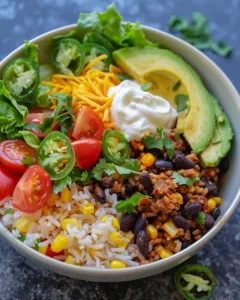 Delicious Loaded Mexican Taco Bowl filled with fresh ingredients and vibrant colors