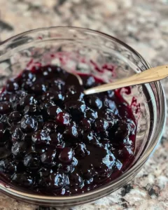 Luxurious blueberry compote served on a dessert plate