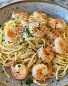 Delicious one-pot garlic butter shrimp pasta garnished with parsley