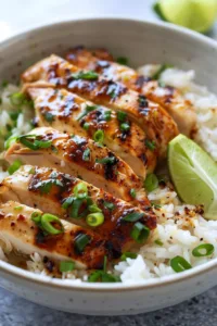 Easy Coconut Chicken Rice Bowl with tender chicken and coconut-flavored rice.
