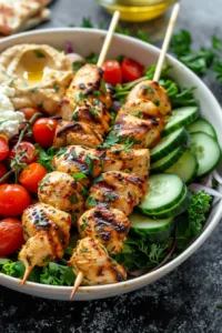 Mediterranean Bowl featuring Grilled Chicken Tawook Skewers and fresh vegetables