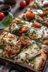 Savory Pesto Chicken Flatbread with fresh ingredients and a vibrant pesto sauce