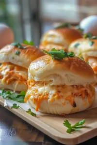 Cheesy Dynamite Chicken Buns with toppings on a plate