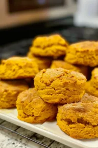Delicious easy pumpkin scones freshly baked and served on a plate.