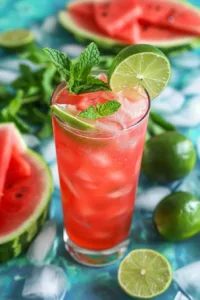 Refreshing glass of juicy watermelon limeade with garnishes