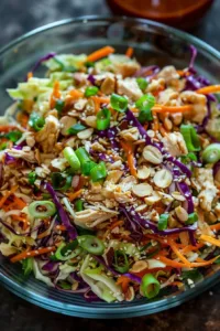 Sesame Chicken Cabbage Crunch Salad with vibrant vegetables and sesame dressing